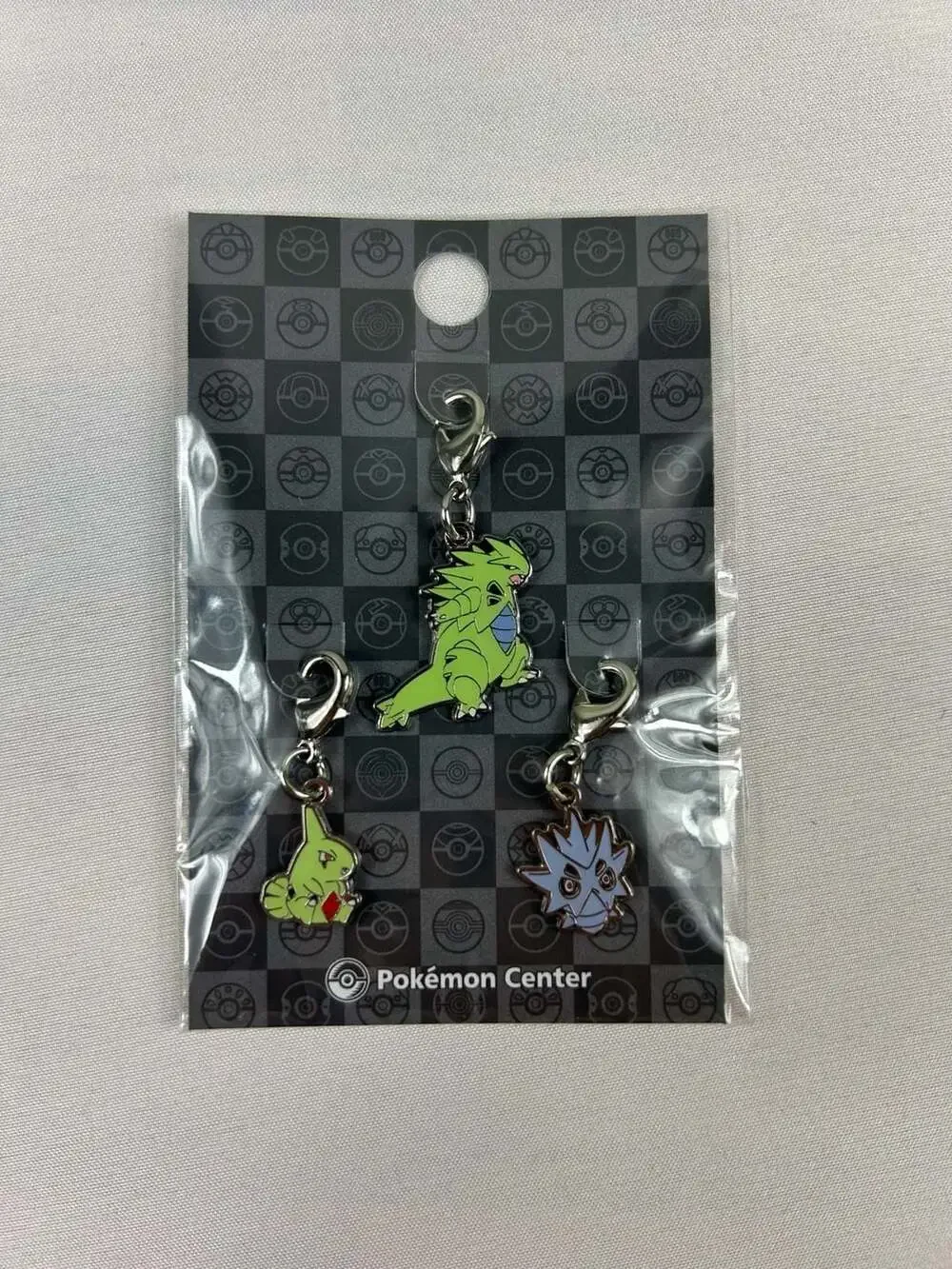 Pokemon Center Tyranitar, Pupitar, & Larvitar Metal Charm Evolution Set New